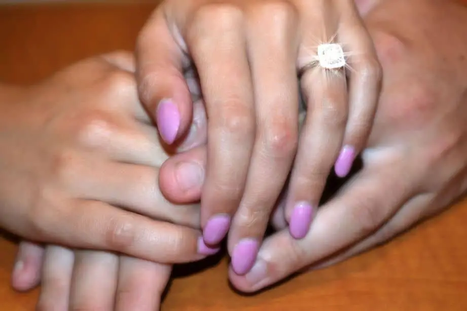 Vibrant Moissy Ring on a Woman's Hand, but Does Moissanite Lose its Sparkle Over Time?